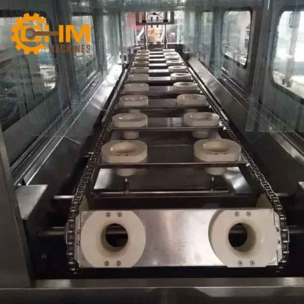 Dây Chuyền Sản Xuất Nước Uống Đóng Bình Tự Động 100-150B/H 13 day chuyen san xuat binh 20l 02