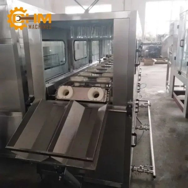 Dây Chuyền Sản Xuất Nước Uống Đóng Bình Tự Động 100-150B/H 11 day chuyen san xuat binh 20l 04